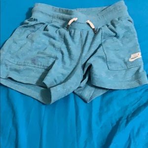 Blue Nike shorts